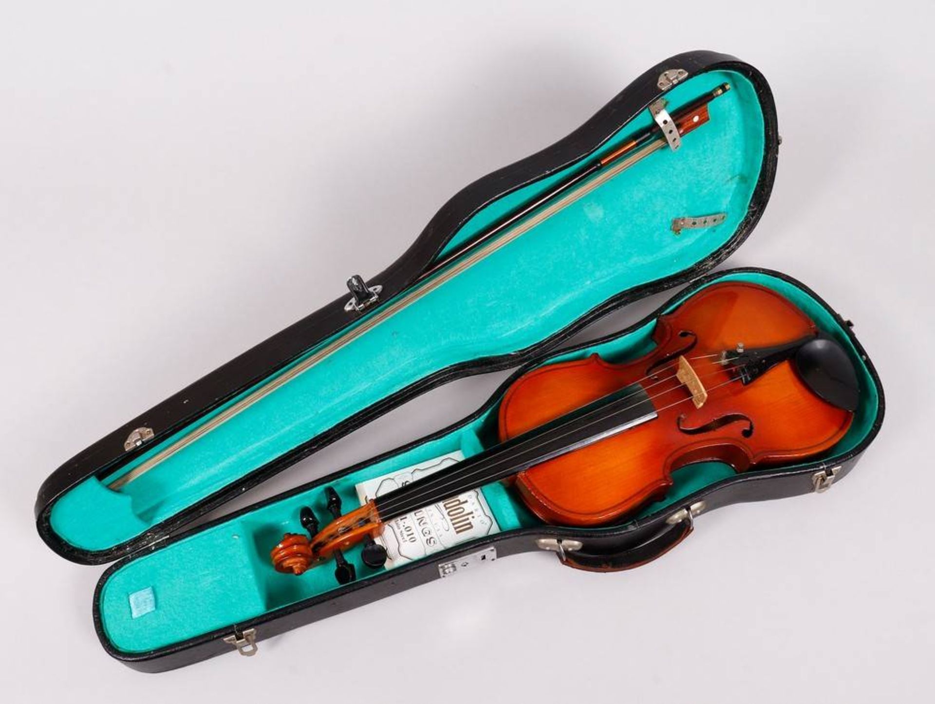 Violin in a case, unknown manufacturer, 20th C.