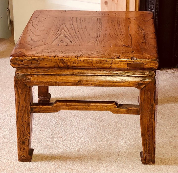 A Chinese hardwood bedside table. 30cm H x 36cm W x 36cm D