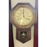 A late 19th century American Ansonia wall clock, octagonal form, brass circular glazed front dial,