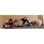 A collection of childrens toys to include bears, Meerkats, Fisher Price garage, dolls, board