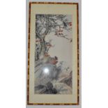 A framed and glazed Chinese print of pheasants in a landscape.