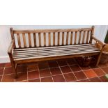 A 20th Century Teak Garden Bench. 183cm W