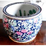 A group of oriental ceramics to include a fish bowl decorated in enemalled peonies and with fish