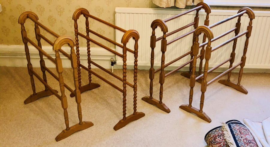 Four 20th Century pine towel rails. (4)