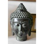 A bronze Buddhas head.