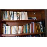 A quantity of books on 6 shelves to include Observers books, fiction, James Bond paperbacks, Biggles