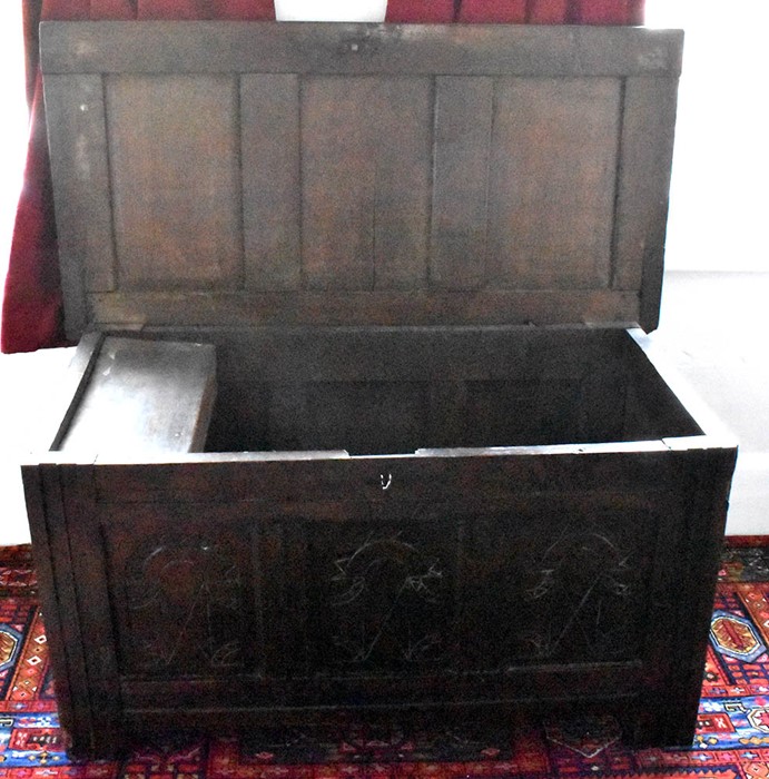 A Charles II late 17th century oak blanket chest, circa 1680, three moulded panel lid enclosing - Image 2 of 2