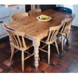 A 20th Century pine kitchen table and six chairs on turned supports (7) table: 77cm H x 168cm W x