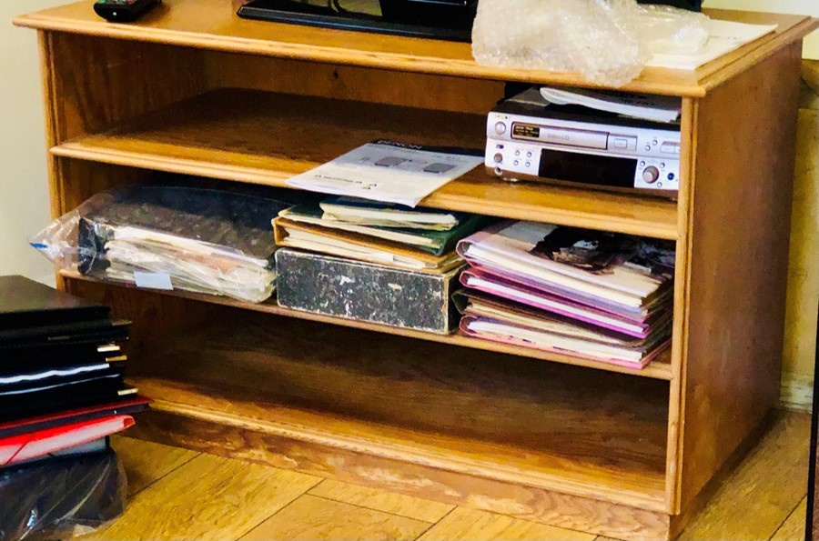 A 20th Century oak Television stand; a similar bookcase (2)