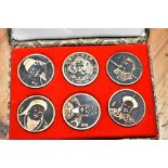 A box containing numerous packs of commemorative coins from the Palace Museum, Beijing depicting '