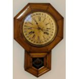 A late 19th century American Ansonia wall clock, octagonal form, brass circular glazed front dial,