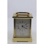 A late 20th Century brass battery mantle clock by Woodford