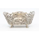 A Dutch silver shaped oval bowl, openwork scrolling sides with cartouches chased with figures