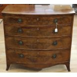 A George III mahogany chest of drawers, bow fronted form, fitted with four drawers with original