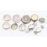 A collection of silver, white metal and plated pill boxes to include: 2 sweet shaped, plated; a pair