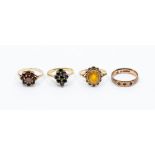A collection of 9ct gold dress rings to include a diamond shaped  blue sapphire cluster ring, size