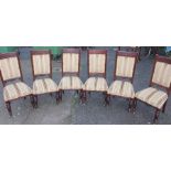 A set of six Victorian dining chairs, raised on turned legs, 110cm high, 52cm wide, 49cm deep,
