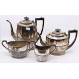 An early 20th Century Georgian style plated four piece tea and coffee set, gadroon lower sections (