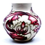 Moorcroft Pottery: A Moorcroft Trial vase bearing date mark for 1998. Height approx 8.5cm. Impressed