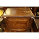 *** LOT WITHDRAWN *** A mid 20th Century oak coal box, panelled sides