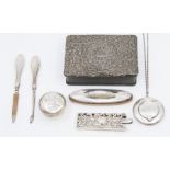 A group of silver to include: small compact on a chain, manicure set, a Victorian openwork