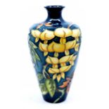 Moorcroft Pottery: A Moorcroft Collectors Club numbered edition 'Wisteria' pattern vase designed