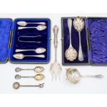 A collection of cased and uncased flatware to include:  A George V serving fork, body, stem and