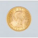 A 1963 Elizabeth II gold sovereign.