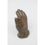 A 19th Century white metal novelty vesta cast in the form of a Knight's hand with armour