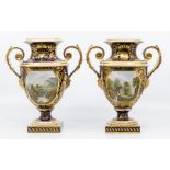 A pair of early 19th Century Derby vases, Bloor period, with scenes of Wales and Italy, square