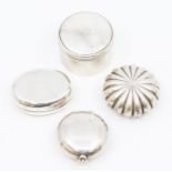 A collection of silver boxes to include:  Edwardian circular double pill box, by Samuel Jacob,
