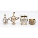 A Victorian silver two handled oil pourer, profusely chased body with plain detachable spouts,