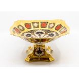A Royal Crown Derby 1128 Imari range square sectioned comport, in the solid gold band pattern, 2nd