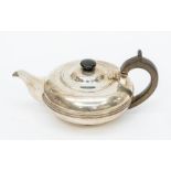 An George V  silver squab shaped teapot, ebonised finial and fruitwood handle, Sheffield, 1912,