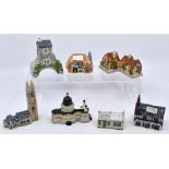 A collection of seven castle cottages, hand made and hand painted
