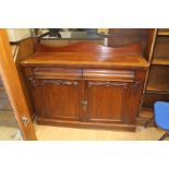 A Victorian mahogany chiffonier, splash back, fitted with two frieze drawers over two doors,