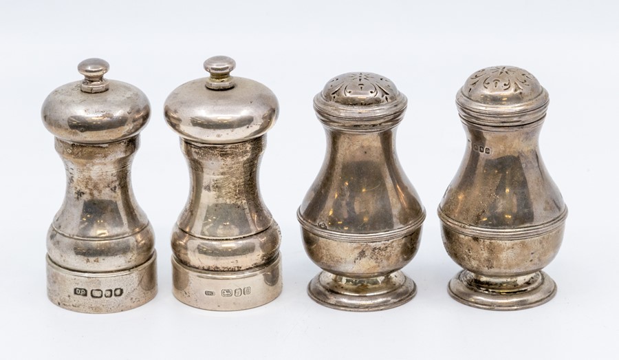 A pair of George V larger pear shaped silver pepper pots, London, circa 1918, 6.90 ozt, marks rubbed