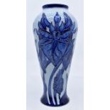 Moorcroft Pottery: A Moorcroft modern Florian style 'Iris' vase dated 2001. Height approx 20.5cm.