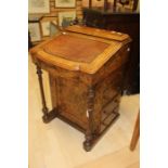 A Victorian burr walnut Davenport, slope fronted, leather inset writing surface, stationary box to