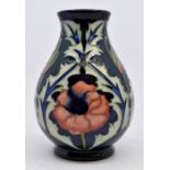Moorcroft Pottery: A Moorcroft 'Poppy' vase designed by Rachel Bishop. Height approx 13.5cm.