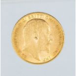 A 1909 Edward VII gold sovereign, London mint.