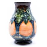 Moorcroft Pottery: A Moorcroft 'Cluny' pattern vase designed by Sally Tuffin. Height approx 10cm.