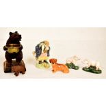 Three Royal Doulton small animal figures, two pigs, one dog, Beswick Beatrix Potter Tommy Brock,