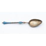 An early 20th Continental Baltic style gilt metal and enamel spoon, the bowl monogrammed