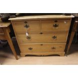 A late 19th Century pine chest of drawers, two short over two long, raised on shaped feet, 79cm