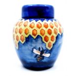 Moorcroft Pottery: A Moorcroft 'Honeycomb' pattern ginger jar and cover designed by Philip Gibson.