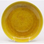 A Chinese yellow ground dish, dragon decoration, six Character marks to underside