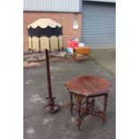 An Edwardian mahogany octagonal topped occasional table measuring 74cm high and 73cm in diameter,