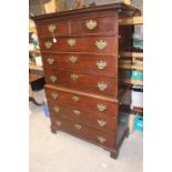 A George III mahogany chest on chest, circa 1775, the upper section with fretwork over two short and