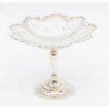 A George VI raised silver tazza / bon bon dish, wavy floral bowl with reticulated oval pattern